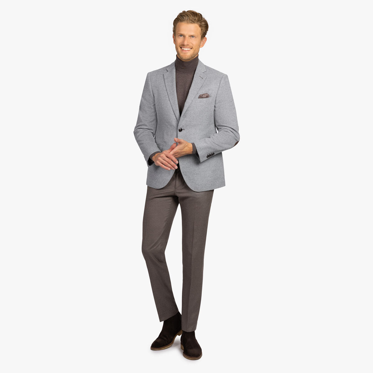 Mann in eleganter Herrenmode gekleidet.