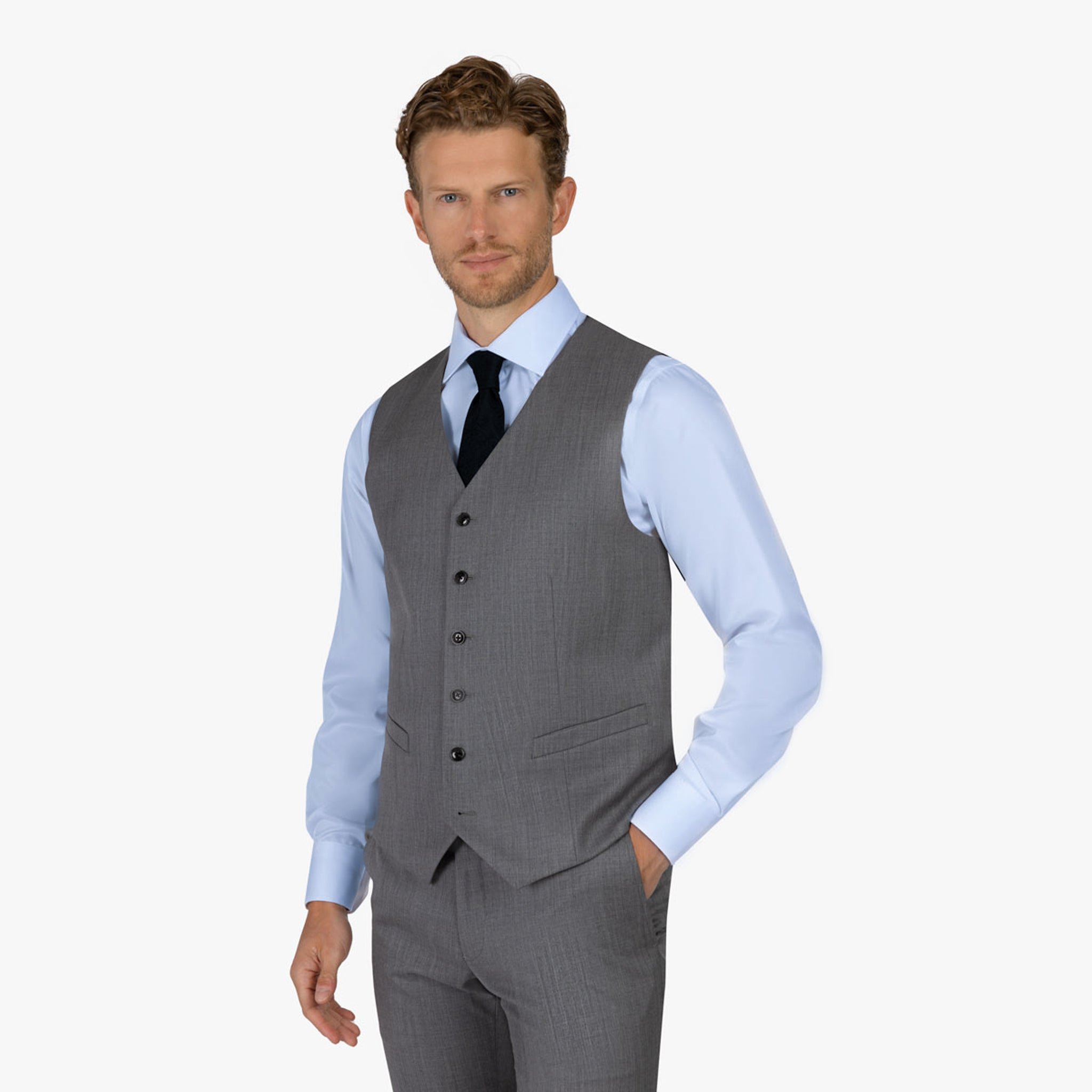 Mann in grauer Anzugweste.