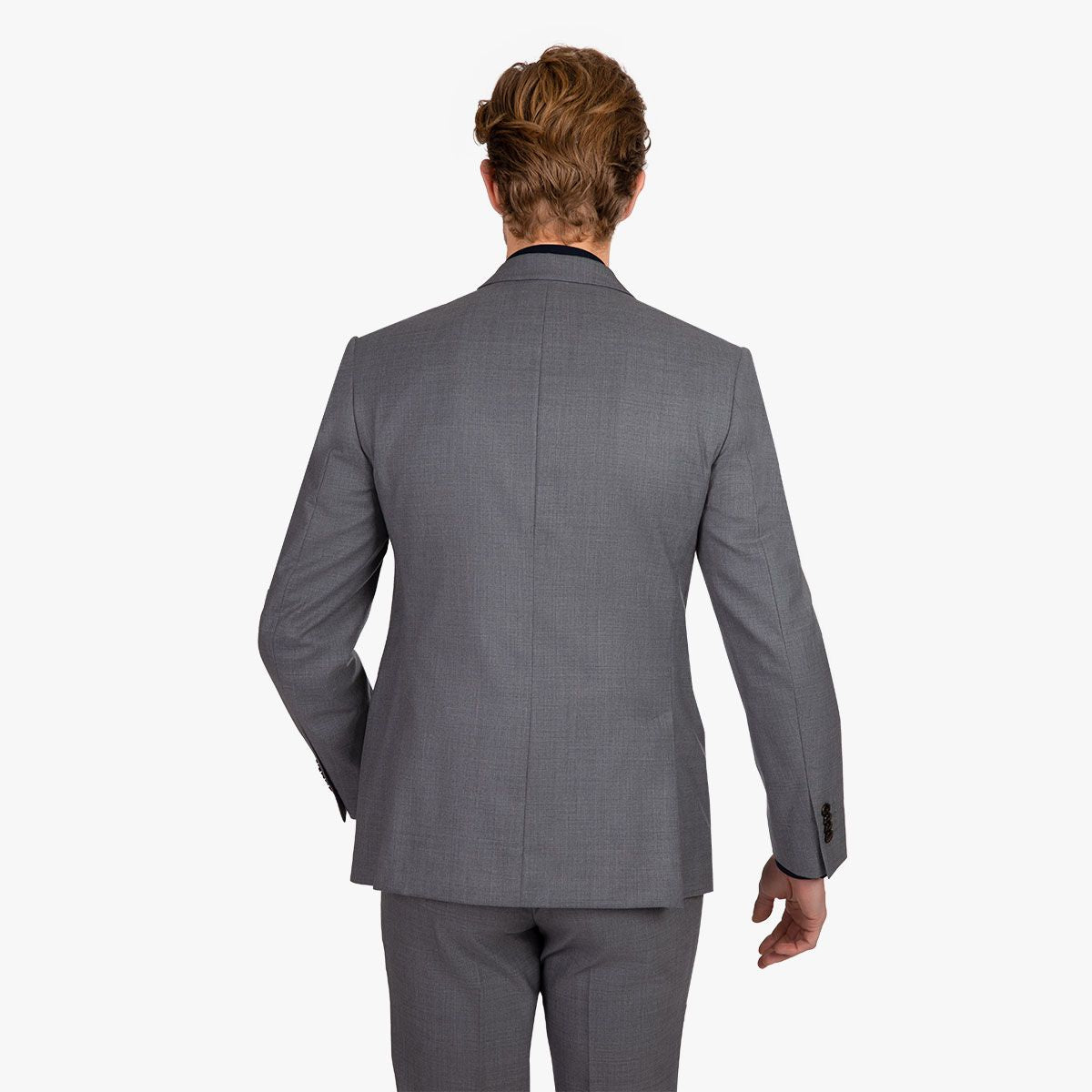 Mann im grauen Anzug, Rückansicht.