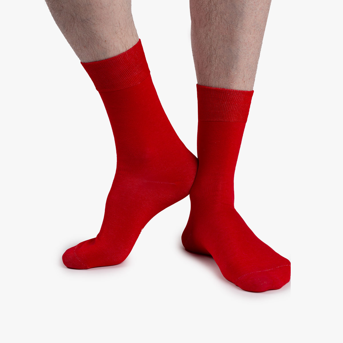 Socken in rot aus der Sockenbox am Fuß