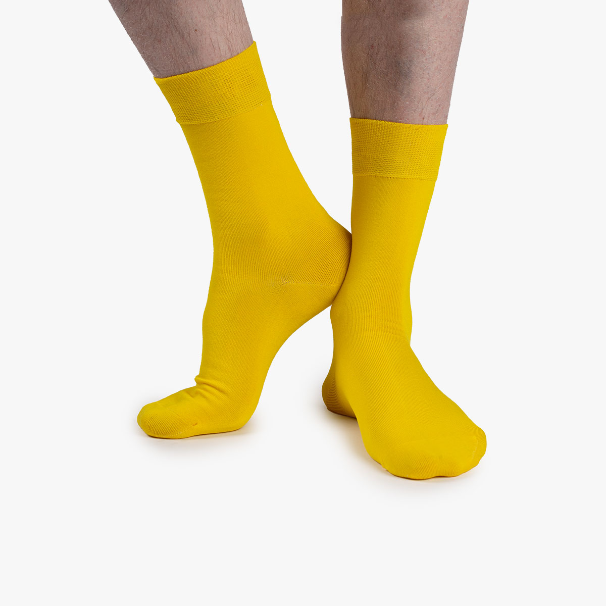 Socken in gelb aus der Sockenbox am Fuß